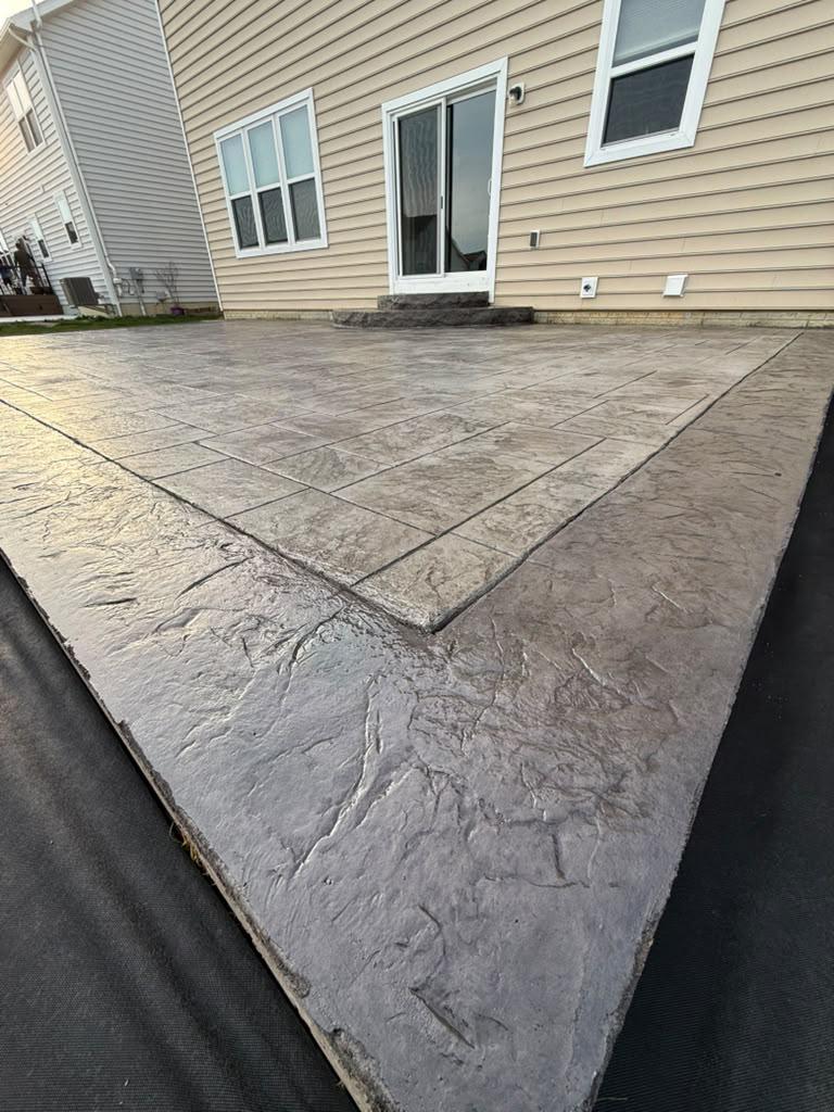 Close-up of a precisely finished concrete slab with troweled border detail